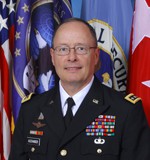 NSA director defends surveillance, saying it has stopped terror plots