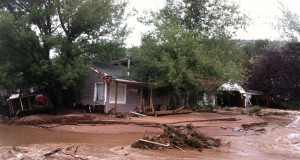 Community rallies around firefighter who lost home in flood