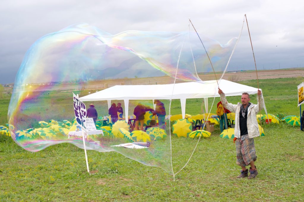 Protesters found other ways to pass the time before marching to the well site.