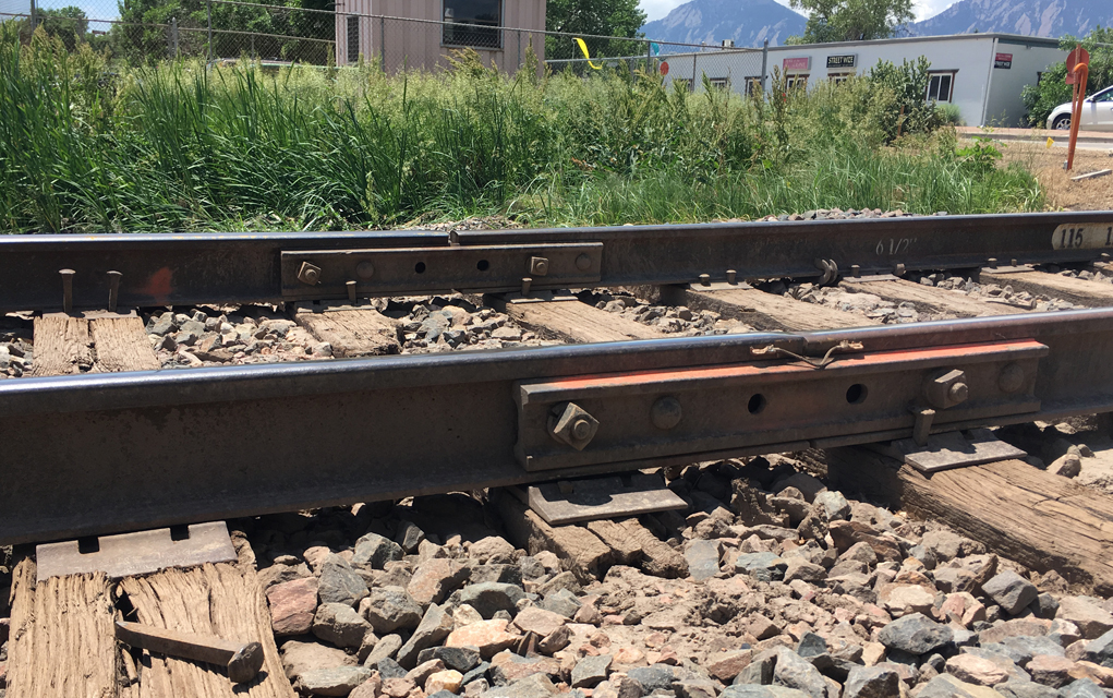 This is the controversial section of the newly updated 55th Street railroad crossing, where the old track and new track come together. Some spikes appear to be no longer in place and others appear to be missing their heads. Several citizens have expressed their concerns over the safety of the newly repaired section of track. 