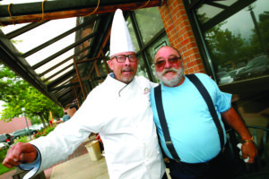 An impromptu meeting of Antonio Laudisio and Kirk T. Bachmann, president of Escoffier School of Culinary Arts.