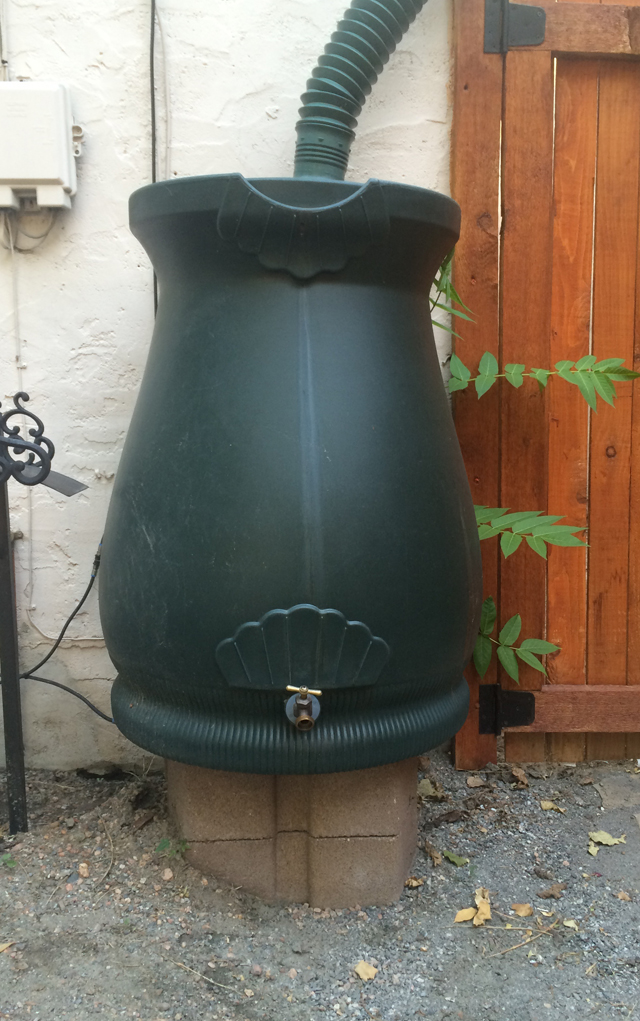 Barrels such as this one, store rainwater for outdoor use and were just legalized in Colorado this month. 