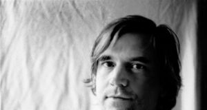 Just a kid with a nylon string guitar