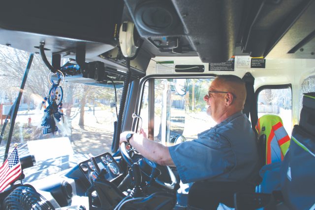 Steve Klemish driving a composting truck in Longmont