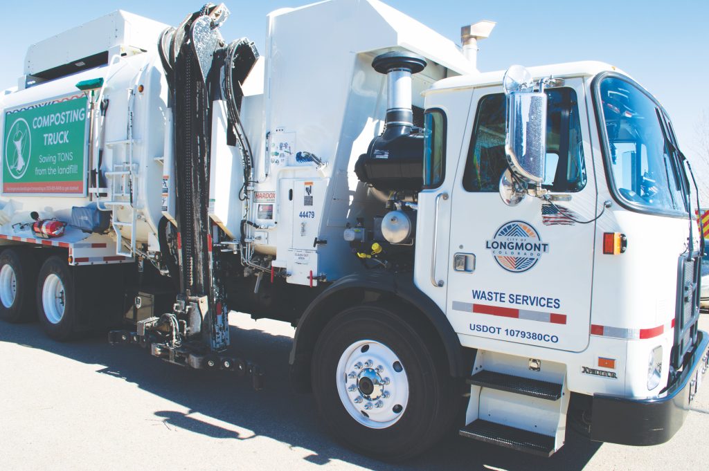 a composting truck from the city of longmont waste services